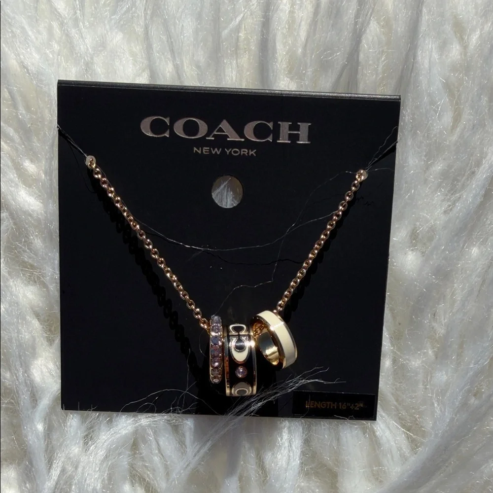NWT Coach Signature Enamel Rondell Gold and Black Pendant Necklace